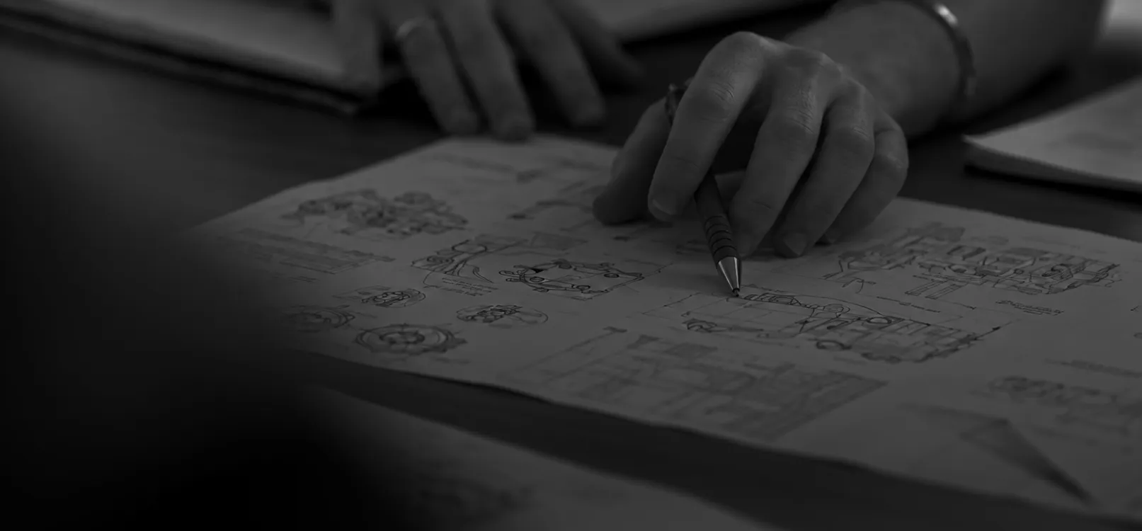 Technical drawings being reviewed during product development